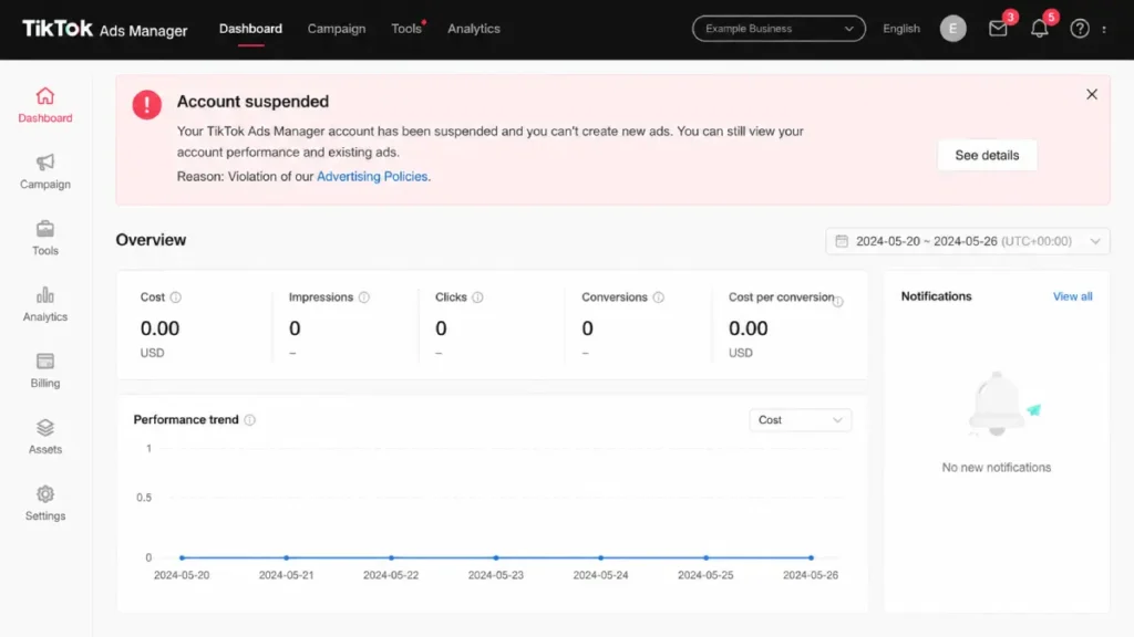 TikTok Ads Manager suspension notification banner example